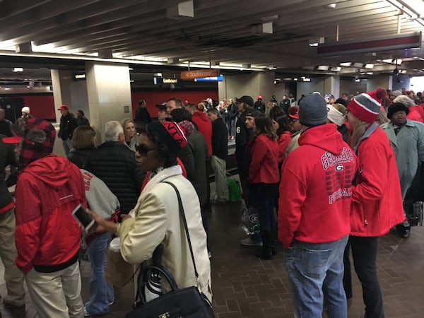 The crowd waiting for the westbound train Monday afternoon at the Five Points MARTA station.