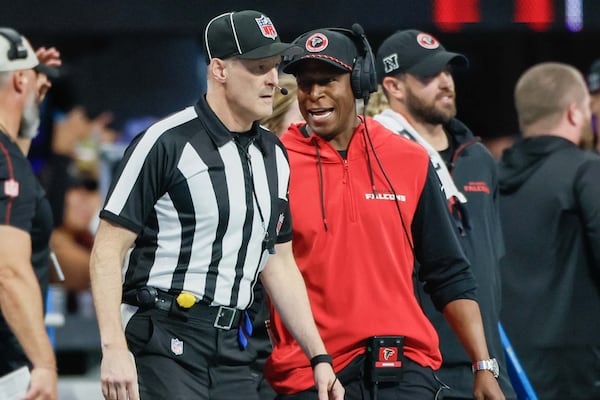 Falcons head coach Raheem Morris argues with a referee during the second half of an NFL football game against the Los Angeles Chargers on Sunday, December 1, 2024, at Mercedes-Benz Stadium in Atlanta. 
(Miguel Martinez/ AJC)