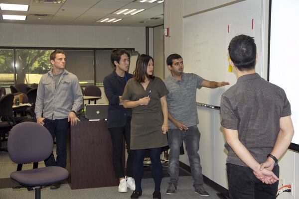 A team of four Atlanta college students won a national contest and summer internships at Toyota for pitching an app-based taxi service that would give people who use wheelchairs a better way to get around.