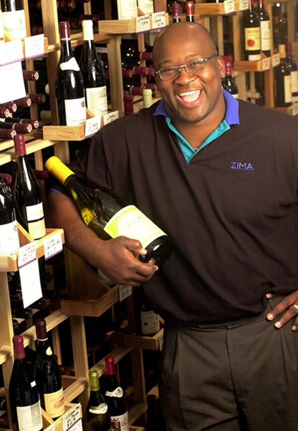 Former Falcons offensive lineman Chris Hinton has operated two wine stores in Metro Atlanta for almost two decades. (AJC File)