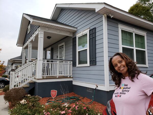 Lawanda Gibson, a childcare curriculum coordinator, became a first-time homebuyer when she moved into an Atlanta Habitat for Humanity subdivision in the city’s northwest. Since then, she said, she’s finished a bachelor’s degree and earned a master’s degree. She and neighbors look out for one another, she said. “We all came from the same struggle.” MATT KEMPNER / AJC