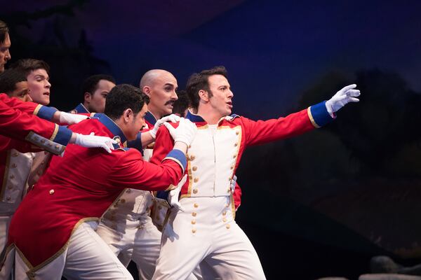 Santiago Ballerini as Tonio in "Daughter of the Regiment," with the chorus.