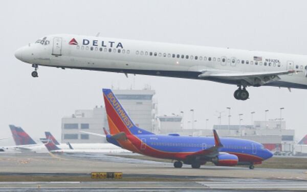 Air traffic controllers employed at airports such as Hartsfield-Jackson International have the highest median wage for jobs that typically require less than a bachelor's degree.