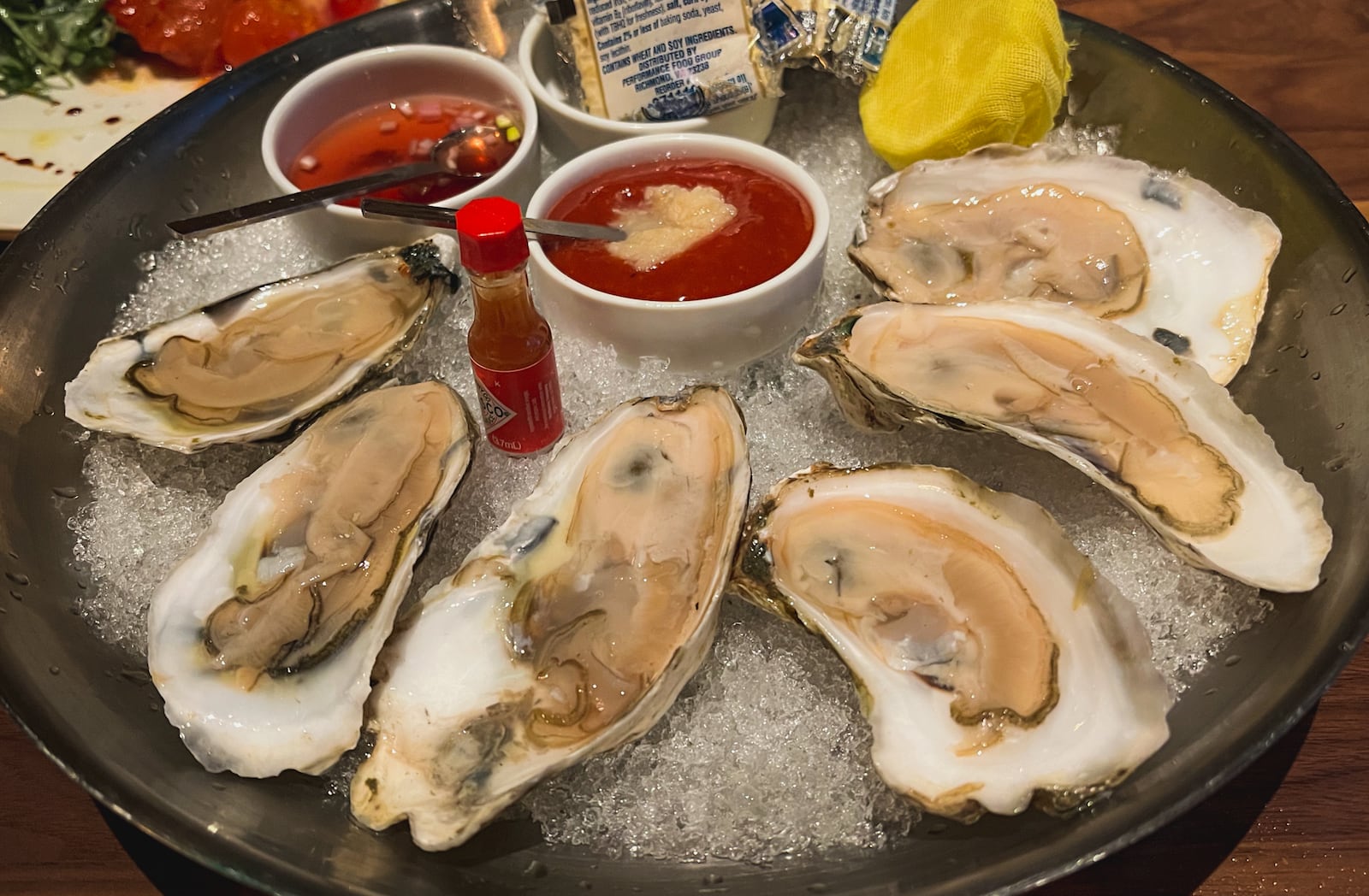 Raw oysters at Bask Steakhouse taste clean and fresh, and are presented beautifully. Henri Hollis/henri.hollis@ajc.com