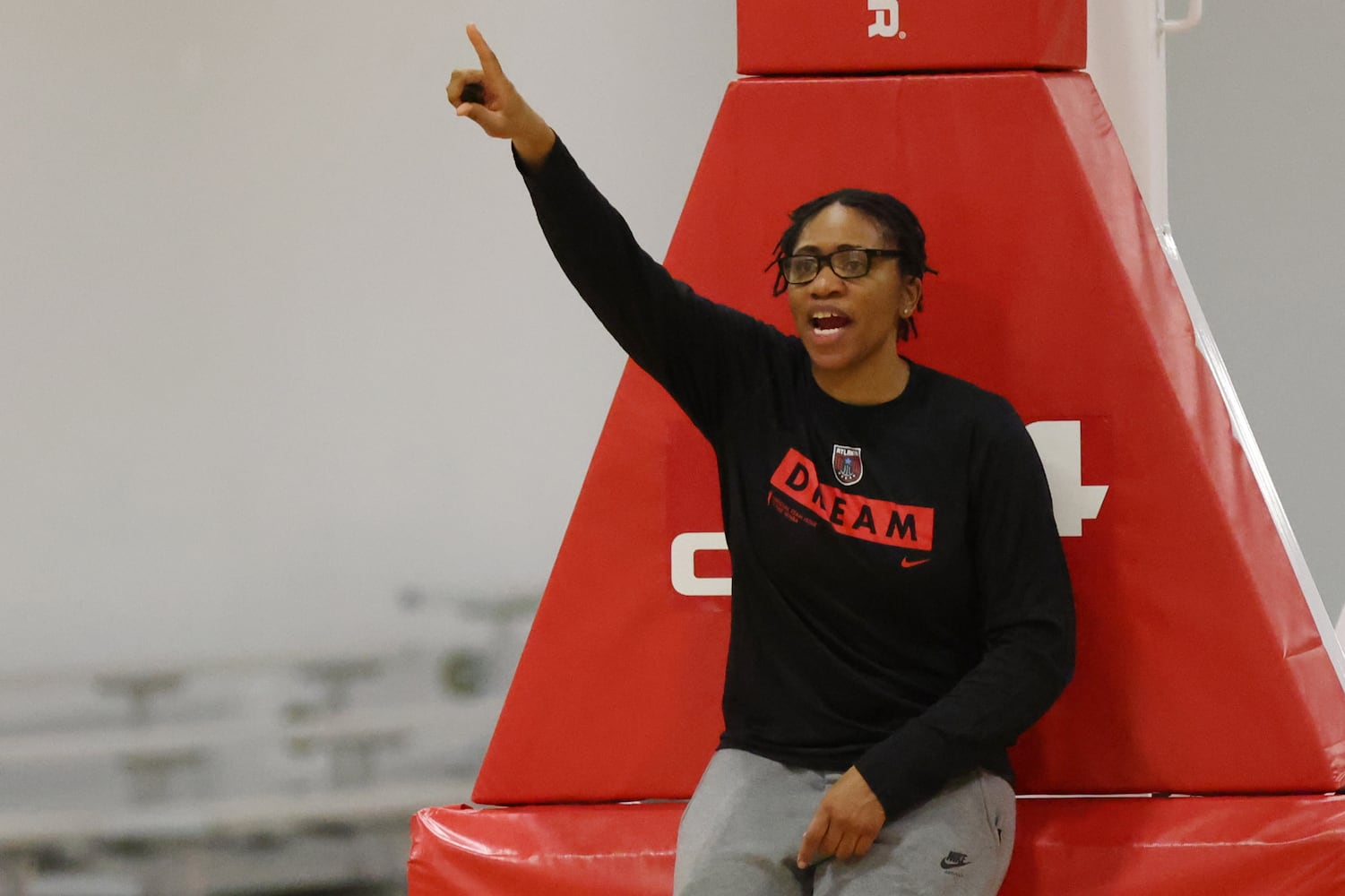 Atlanta Dream head coach Tanisha Wright gives directions from the back of the court during a practice session on Monday, April 18, 2022. Miguel Martinez/miguel.martinezjimenez@ajc.com