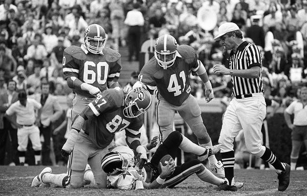 Georgia's Jimmy Payne records a sack against Vanderbilt in 1980. AJC file photo