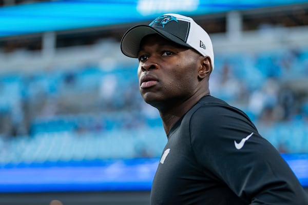 Carolina Panthers defensive coordinator Ejiro Evero looks on before an NFL football game against the New Orleans Saints Monday, Sept. 18, 2023, in Charlotte, N.C. (AP Photo/Jacob Kupferman)