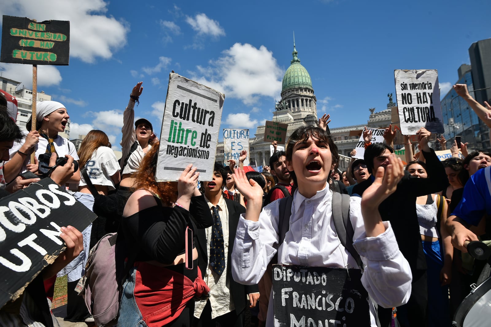 Students and professors rally outside Congress as lawmakers debate President Javier Milei's veto of a law to increase funding for public universities in Buenos Aires, Argentina, Wednesday, Oct. 9, 2024. (AP Photo/Gustavo Garello)