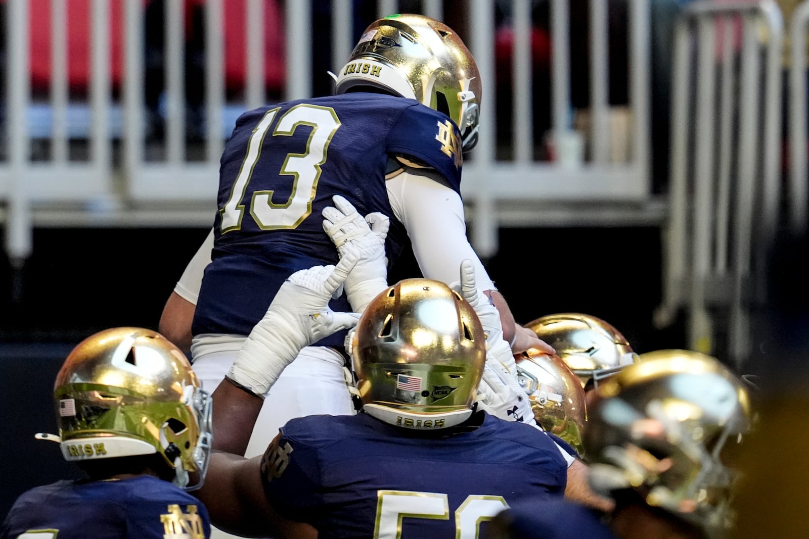 Notre Dame quarterback Riley Leonard (13) celebrates his touchdown against Georgia Tech during the first half of an NCAA college football game, Saturday, Oct. 19, 2024, in Atlanta. (AP Photo/Mike Stewart)