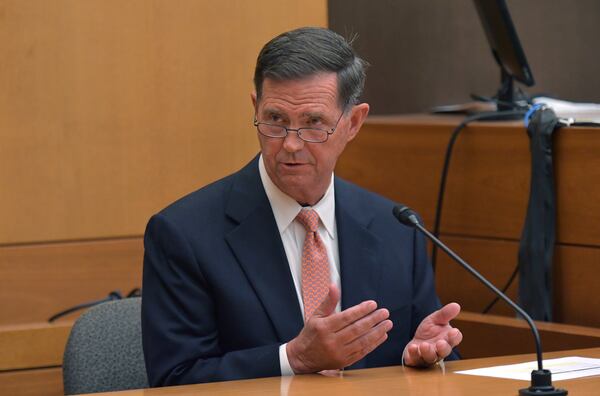 April 11, 2018 Atlanta - Stanley Smith Jr., a wills and estate attorney, testifies during the Tex McIver murder trial at the Fulton County Courthouse on Wednesday, April 11, 2018. HYOSUB SHIN / HSHIN@AJC.COM