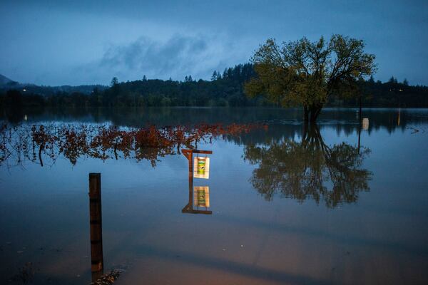 Property off River Road floods as the Russian River overflows in Sonoma County, Calif., on Friday, Nov. 22, 2024. (Santiago Mejia/San Francisco Chronicle via AP)