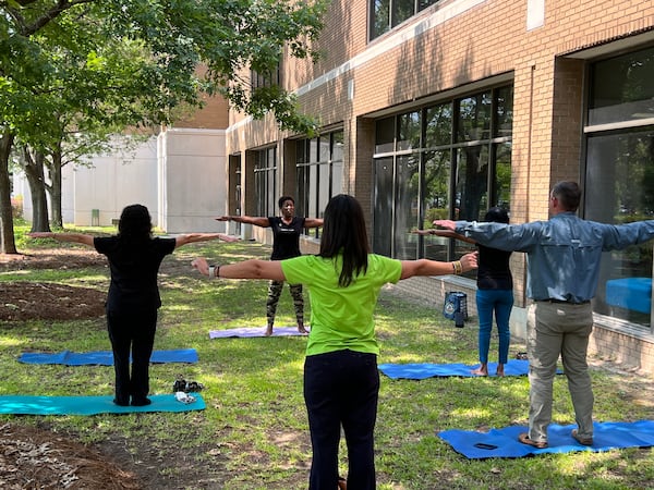 Phoebe Putney Health System, based in Albany, Georgia, observed Mental Health Awareness Week in May 2022.  Staff took part in a meditation session, seen here, and also relaxed with therapy dogs.  Year-round, the health system says that staff can download a mindfulness app called Wise at Work, and are eligible for six free therapy sessions a year. (PHOTO courtesy of Phoebe Putney Health System)