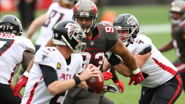 Tampa Bay Buccaneers defensive end Ndamukong Suh (93) chases Atlanta Falcons quarterback Matt Ryan (2) during the first half Sunday, Jan. 3, 2021, in Tampa, Fla. (Mark LoMoglio/AP)