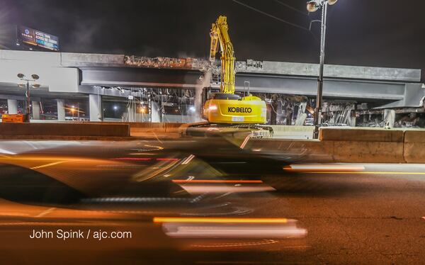 This is the view of the I-85 collapse site from the Buford-Spring Connector on Monday. JOHN SPINK / JSPINK@AJC.COM