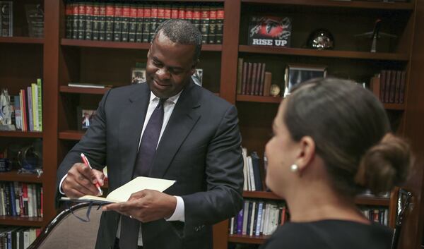 September 2, 2015 Atlanta: Mayor Kasim Reed (left) with director of communications, Anne Torres (right), in 2015. JOHN SPINK / JSPINK@AJC.COM