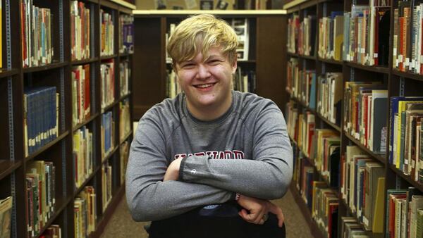 Ulysses High School senior Braxton Moral sits for a portrait at the school in Ulysses, Kansas, on Wednesday, Dec. 12, 2018. The 17-year old graduates from high school and Harvard weeks apart in May.