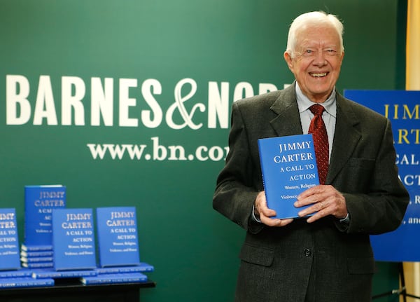 Former US President Jimmy Carter promoting his new book "A Call To Action Women, Religion, Violence, And Power" at Barnes & Noble on 5th Avenue in New York City on March 25, 2014. (Photo by Jemal Countess/Getty Images)