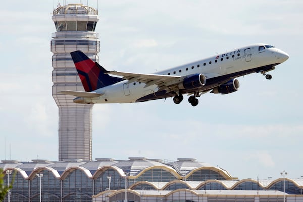 A Delta Air Lines jet takes off from Ronald Reagan Washington National Airport in Arlington, Va. 