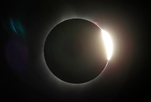 The moon partially covers the sun after a total eclipse Monday, Aug. 21, 2017, near Redmond, Ore. (AP Photo/Ted S. Warren)