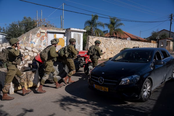 Israeli soldiers patrol the perimeter of the agricultural settlement of Avivim, next to the Lebanese border, in upper Galilee, Israel, Monday Dec. 2, 2024. (AP Photo/Ohad Zwigenberg)