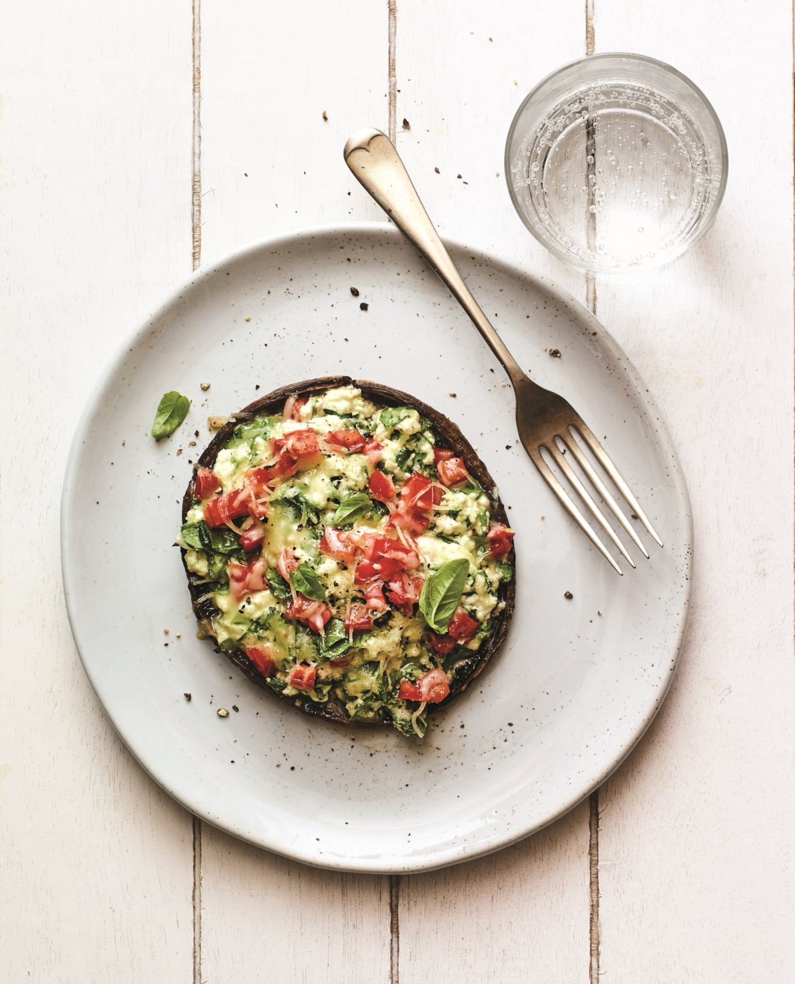 A “pizza” without bread is possible with the Keto Portobello Mushroom Pizza from “The Essential Vegetarian Keto Cookbook” from the editors of Rodale Books. CONTRIBUTED BY HELENE DUJARDIN