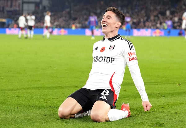 Fulham's Harry Wilson celebrates scoring their side's second goal of the game during the Premier League match at Selhurst Park, London, Saturday Nov. 9, 2024. (Zac Goodwin/PA via AP)