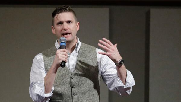 In this Dec. 6, 2016, file photo, Richard Spencer, who leads a movement that mixes racism, white nationalism and populism, speaks at the Texas A&M University campus in College Station, Texas. (AP Photo/David J. Phillip, File)