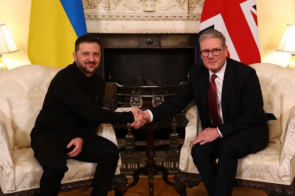 Britain's Prime Minister Keir Starmer, right, and Ukraine's President Volodymyr Zelenskyy, left, shake hands during a meeting at 10 Downing Street in London, England, Saturday, March 1, 2025. (Peter Nicholls/Pool Photo via AP)