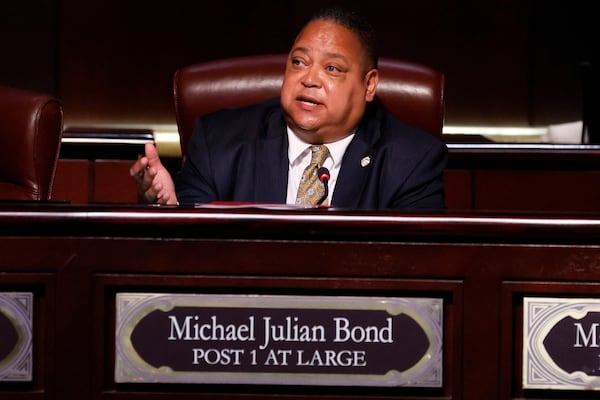 Atlanta City Council member Michael Julian Bond speaks to the audience during a council meeting on Aug. 15, 2022. (Miguel Martinez/AJC)