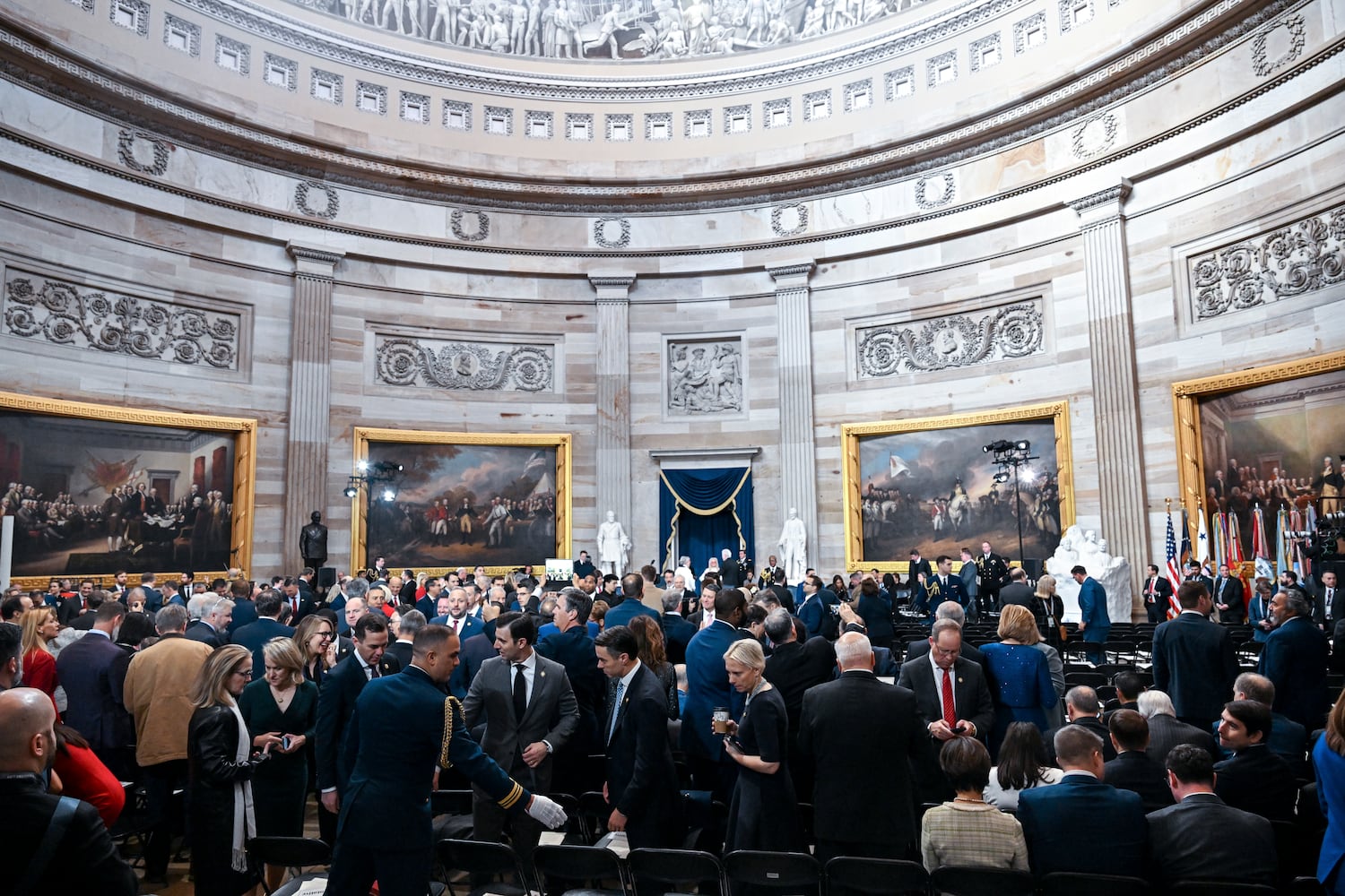 Guests are shown to their seats before the inauguration of Donald Trump as the 47th president in the Rotunda at the Capitol in Washington on Monday morning, Jan. 20, 2025. (Kenny Holston/The New York Times)