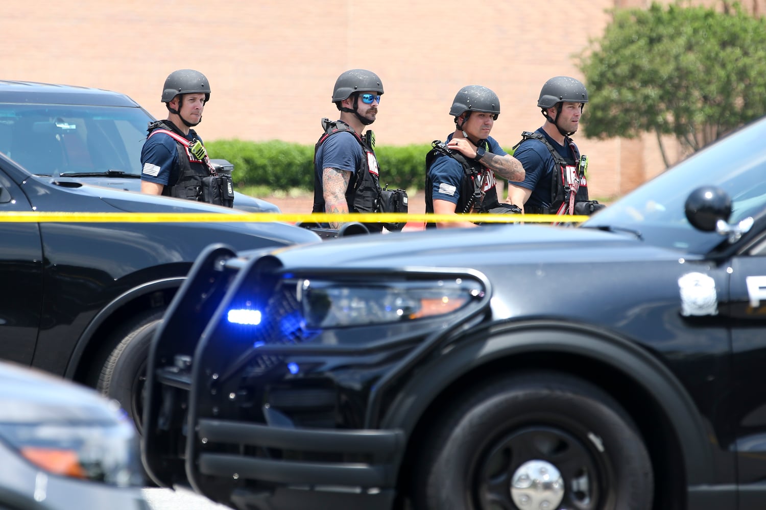 Man in custody after standoff prompts evacuations near North Point Mall 