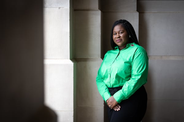 Shontel Cargill, shown here at the Georgia Capitol, works to help legislators understand the importance of mental health care for Georgia moms. The pandemic exacerbated mental health problems that often occur for new moms and dads, she says. “And it really showed that our healthcare system was not prepared.” (PHOTO by Arvin Temkar / arvin.temkar@ajc.com)