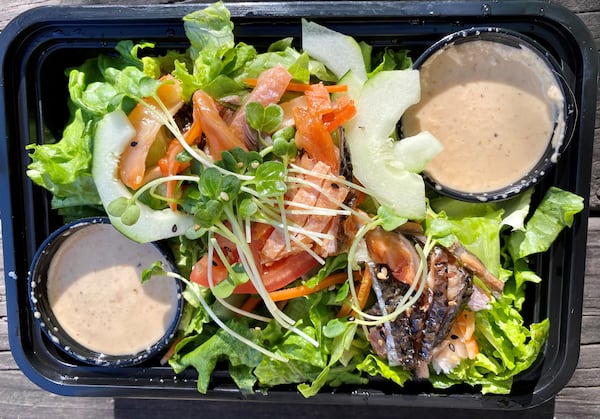 The salmon-skin salad from Nakato Japanese Restaurant on Cheshire Bridge Road is fresh and travels well. (Wendell Brock for The Atlanta Journal-Constitution)