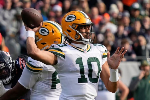 Green Bay Packers' Jordan Love throws during the first half of an NFL football game against the Chicago Bears Sunday, Nov. 17, 2024, in Chicago. (AP Photo/Nam Y. Huh)