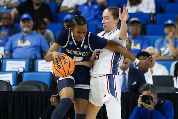 Georgia Tech guard Tonie Morgan, left, dribbles against Richmond guard Alyssa Jimenez, right, during the second half in the first round of the NCAA college basketball tournament, Friday, March 21, 2025, in Los Angeles. (AP Photo/Jessie Alcheh)