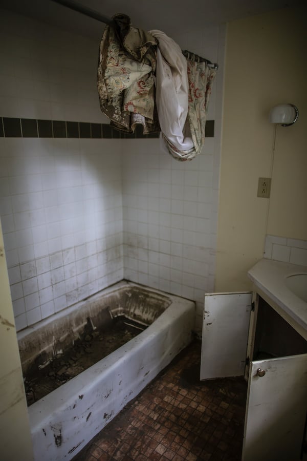 The bathroom in the flood-damaged home of John and Jenny Mackenzie is shown on Sept. 23, 2024 in Peacham, Vt. (AP Photo/Dmitri Beliakov)