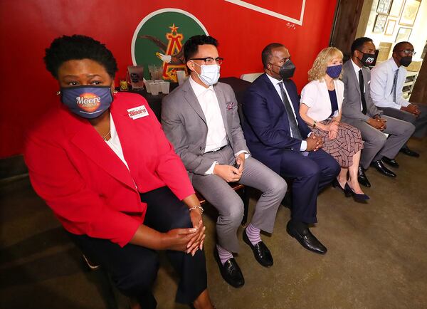 080421 Atlanta: Mayoral candidates Council President Felicia Moore (from left), Councilman Antonio Brown, former Atlanta Mayor Kasim Reed, attorney Sharon Gay, Councilman Andre Dickens, and local businessman Richard Wright take part in a mayoral debate hosted by The Young Democrats of Atlanta at Manuel’s Tavern on Wednesday, August 4, 2021, in Atlanta.   “Curtis Compton / Curtis.Compton@ajc.com”