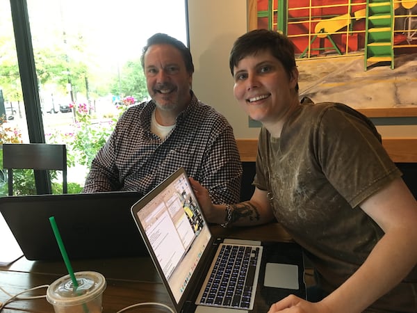 Richard Butti (left) and Crystal Smith work at a Marietta Starbucks on Tuesday.  ELLEN ELDRIDGE / ELLEN.ELDRIDGE@AJC.COM