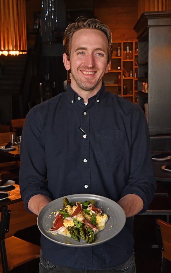 Iberian Pig executive chef Andy Peterson with his Grilled Spring Asparagus, Crumbled Hard-boiled Egg and Jamón Ibérico. (Styling by executive chef Andy Peterson / Chris Hunt for the AJC)