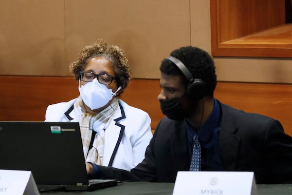 Attorney Gina Bernard sits with her client, Jayden Myrick, during jury selection in the lengthy "Young Slime Life" gang case. File photo.
Miguel Martinez / miguel.martinezjimenez@ajc.com