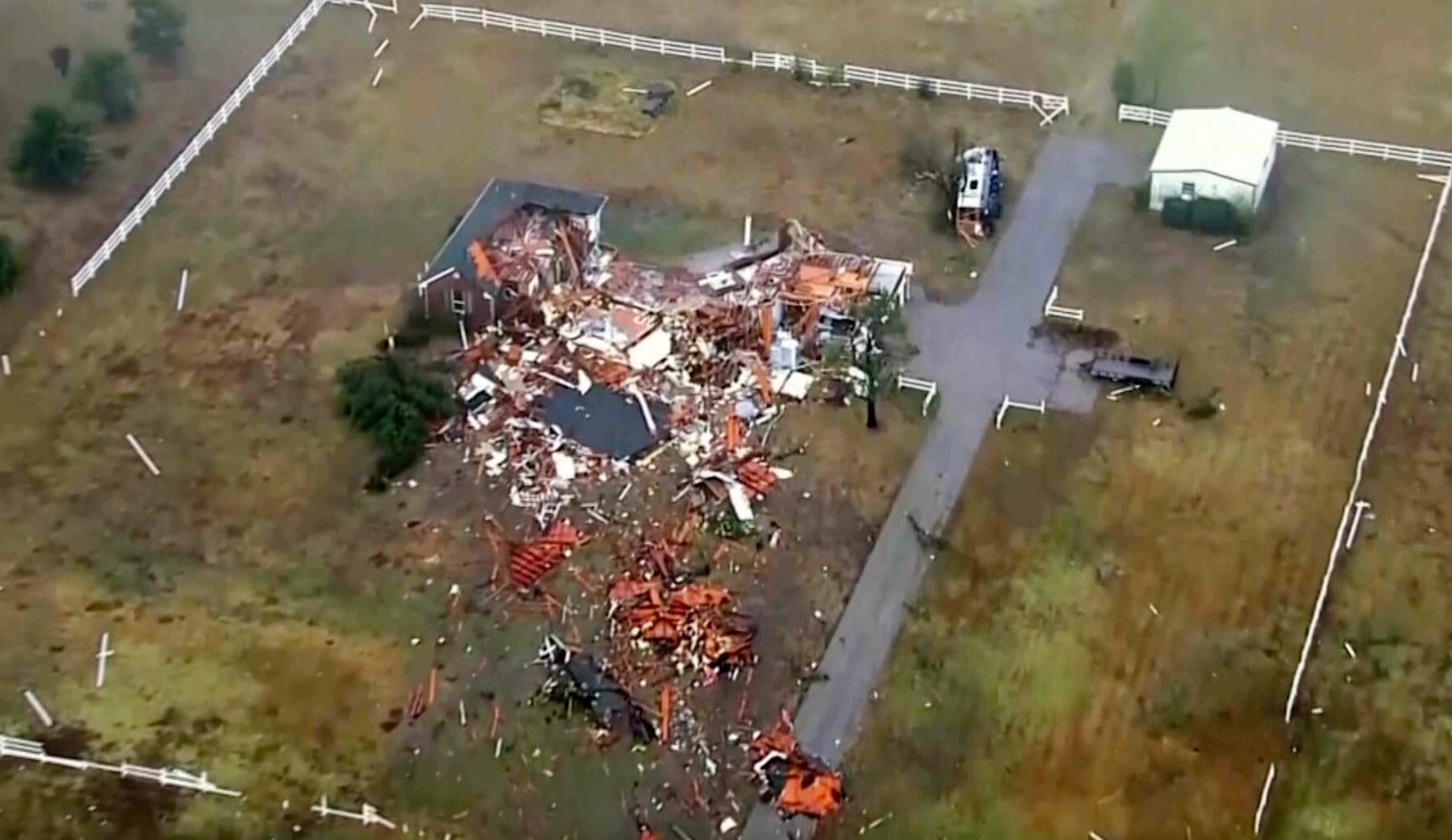 This image taken from video provided by KOCO shows damage caused by a tornado in a neighborhood near 89th and S. Sooner Road in North Moore, Okla., Sunday, Nov. 3, 2024. (KOCO via AP)