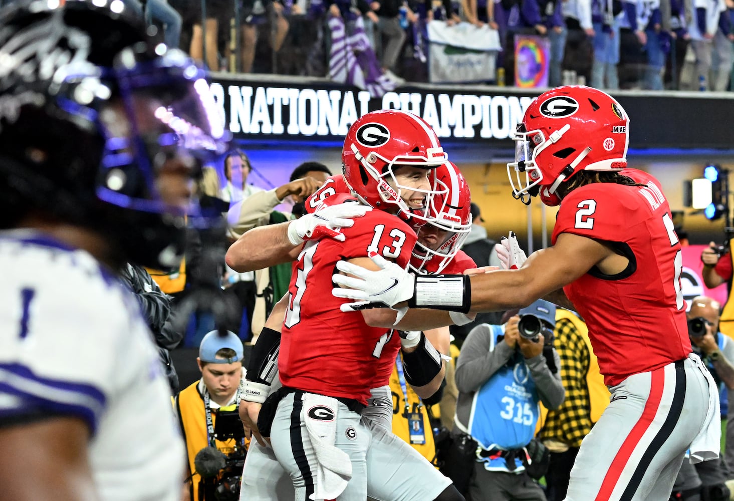 Georgia Bulldogs quarterback Stetson Bennett (13) scores against the TCU Horned Frogs during the first half of the College Football Playoff National Championship at SoFi Stadium in Los Angeles on Monday, January 9, 2023. (Hyosub Shin / Hyosub.Shin@ajc.com)