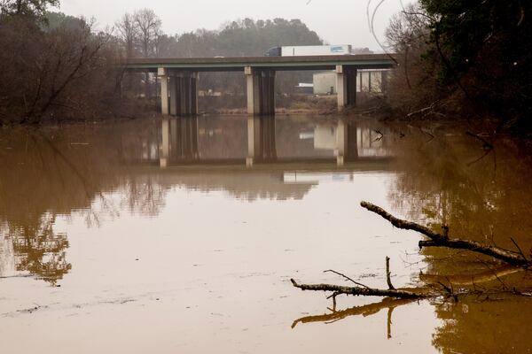 After days of heavy rain, a Chattahoochee River overflow area is filled with water along Riverview Rd in Mableton, GA  December 30, 2018.  STEVE SCHAEFER / SPECIAL TO THE AJC