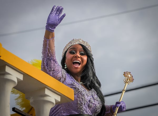 Queen Zulu 2025 Kristen Bonds Mason greets the crowd as the Zulu parade rolls along Jackson Avenue in New Orleans on Mardi Gras Day, Tuesday, March 4, 2025. (Brett Duke/The Advocate via AP)