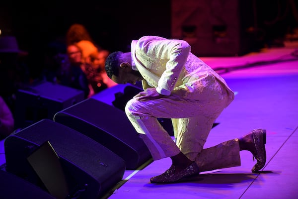 Freddie Jackson bows at the end of his concert performed at the Stockbridge Amphitheater on Saturday, Oct. 23, 2021. (Daniel Varnado/ For the Atlanta Journal-Constitution)