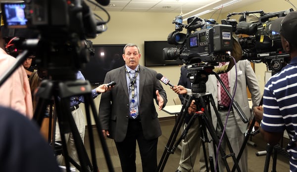 Atlanta Police Cpt. Paul Guerrucci speaks to the media Friday afternoon Sept. 5, 2014 about two recent kidnappings that the department is investigating.