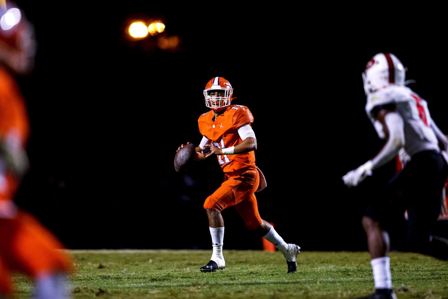 Parkview quarterback Colin Houck (11) looks for an open receiver during a GHSA 7A high school football game between the North Gwinnett Bulldogs and the Parkview Panthers at Parkview High School in Lilburn, Ga., on Friday, Sept. 3, 2021. (Casey Sykes for The Atlanta Journal-Constitution)