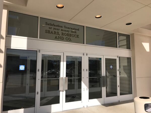 The Sears at Stonecrest Mall is closed but there is still lettering on the doors.