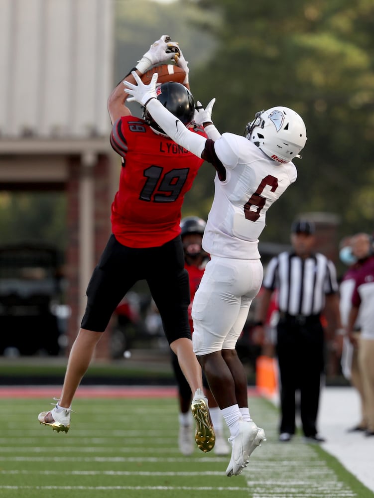 Cherokee defensive back Riley Lyons (19) intercepts a pass intended for Carver-Atlanta wide receiver Qintavious Davis (6) in the first half at Cherokee high school Wednesday, September 2, 2020 in Canton, Ga.. The Carver-Atlanta at Cherokee game is the first football game of the 2020 Corky Kell Classic. JASON GETZ FOR THE ATLANTA JOURNAL-CONSTITUTION