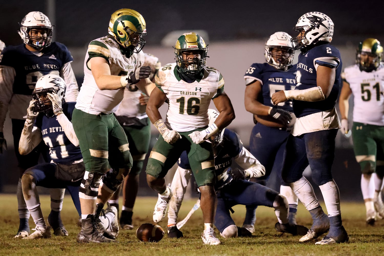 Dec. 18, 2020 - Norcross, Ga: Grayson running back Jayvian Allen (16) celebrates his first down run with offensive lineman Garrett Brophy (52) in the second half against Norcross in the Class AAAAAAA semi-final game at Norcross high school Friday, December 18, 2020 in Norcross, Ga.. Grayson won 28-0 to advance to the Class AAAAAAA finals. JASON GETZ FOR THE ATLANTA JOURNAL-CONSTITUTION